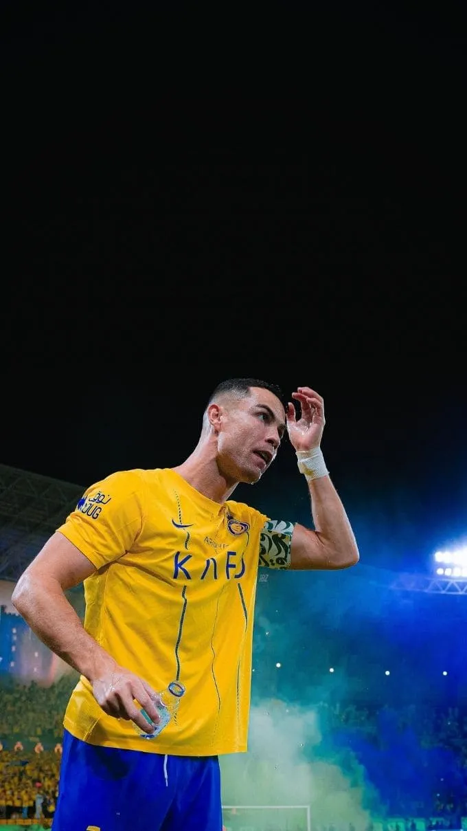 Hình nền Ronaldo trong màu áo đội tuyển quốc gia và Al Nassr